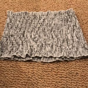 Tube top never worn. White with charcoal gray strip. Size large